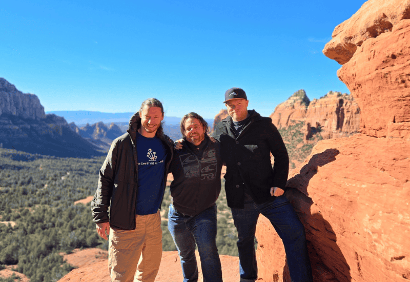 Herbalists at Lost Empire Herbs in a desert canyon landscape.